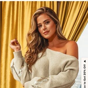 Cupshe Sweater and Skirt Set
Cream Off-Shoulder Sweater with Silver Accents